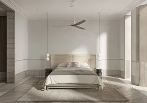 Minimalist bedroom featuring a wooden platform bed, white bedding, and hanging pendant lights.