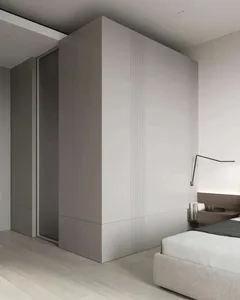 Modern minimalist bedroom featuring metallic accents and clean lines.