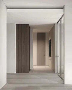 Modern, minimalist entryway with concrete walls and floor.