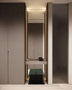 Modern interior design featuring glass, metallic accents, and wooden finish in an entryway