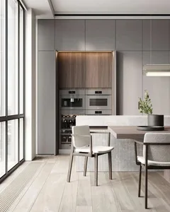 Modern kitchen featuring stone countertops and wooden cabinetry.