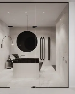 A modern minimalist bathroom with white tiles, black accents, and a floating vanity