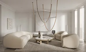 A modern living room featuring neutral-toned furniture and decor, minimalist design elements, and a contemporary art piece on