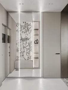 Modern bathroom with a marble panel wall, white walls, and a minimalist design.