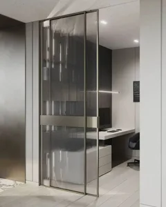 A modern commercial office space featuring glass walls and a minimalist design.