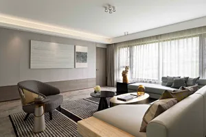 Contemporary living room featuring modern furnishings and decorative elements in a minimalist aesthetic.
