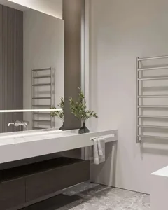 Modern minimalist bathroom interior featuring glass vanity and stainless steel towel rack.