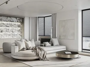 A modern, white-themed living room with neutral-toned materials and minimalistic design.