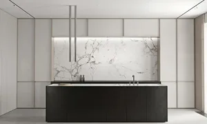 Modern kitchen with white marble walls and black cabinets.