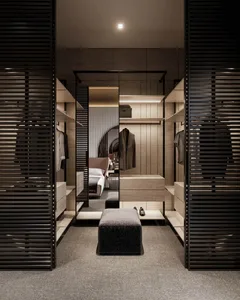 A modern, minimalist closet with wooden shelves and metal accents