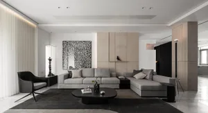 A modern living room with neutral-colored furniture and decor