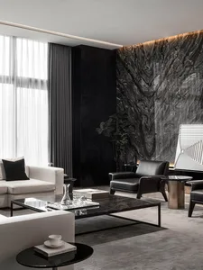 A modern living room featuring marble elements and minimalist design
