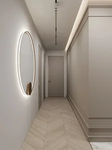 Modern minimalist corridor featuring a marble floor tile design and gold hanging light fixture.