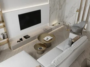 Modern living room with marble walls, minimalist furniture, and a sleek fireplace.