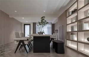 Modern dining room featuring a long wooden table surrounded by six upholstered chairs with contemporary black legs, white cur