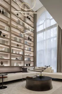 A contemporary living room with a modern interior design, featuring wooden materials, a sectional sofa, and a stylish coffee 