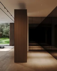 A minimalistic interior with wooden flooring and glass walls
