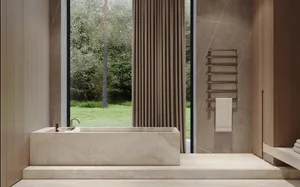 A minimalist bathroom with a large window, marble bathtub, and towel rack.