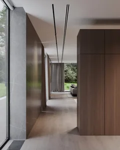 A modern interior space featuring wood flooring and minimalist design elements.