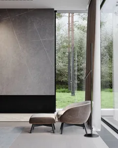 A modern living room featuring marble and glass elements.