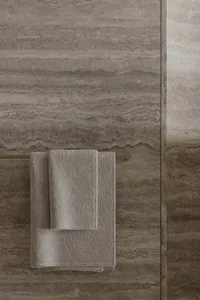 Modern bathroom accessories featuring metal elements