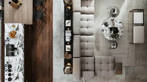 A modern, open-plan living room featuring marble and concrete elements.