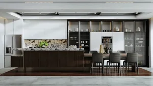 A modern residential kitchen featuring a marble countertop.