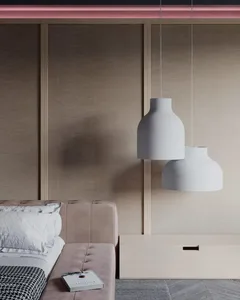 Modern bedroom featuring white decor, a comfortable bed with a tufted headboard, and a minimalist design.