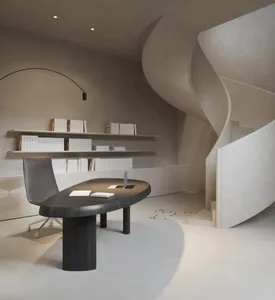 A modern, minimalist home office with a concrete desk, gray chair, and floating bookshelves.