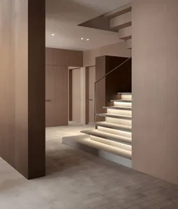 A minimalist interior design featuring wooden, concrete, and metallic elements.