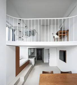 A modern residential home with a white interior and minimalist design.