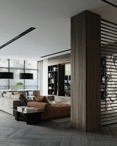 Modern living room with a brown sofa and herringbone-patterned wooden flooring.