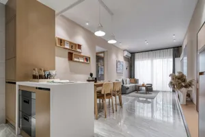 A modern living room with white floor tiles, minimalist decor, and a large window.