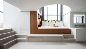 A modern minimalist bedroom with a white bed, wooden headboard, and concrete floor.