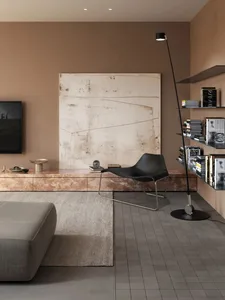 A modern minimalist living room with concrete textures and neutral color palette.