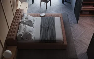 A modern bedroom featuring a textured fabric bed with a wood headboard and grey rug on a wooden floor.