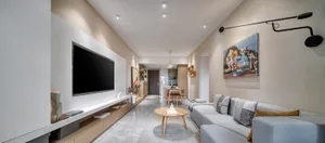 Contemporary living room featuring neutral tones, modern furniture, and a minimalist design.