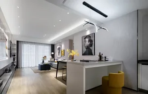 A modern living room with wooden flooring, white walls, and sleek, contemporary furniture.