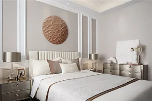 Modern bedroom featuring contemporary design elements with metal headboard, beige walls, and gold accents.