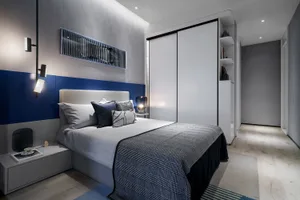 A modern bedroom featuring mixed media materials and minimalist design.