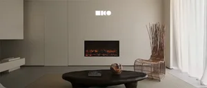 Modern living room with a concrete fireplace hearth and minimalist decor.