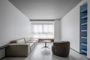 Modern living room with neutral tones and minimalist furniture