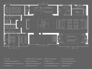 A detailed office layout diagram with white lines on a gray background, showing various rooms and areas within an office spac