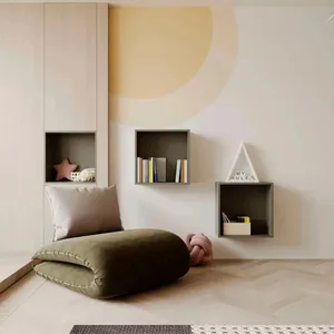 A minimalist child room with taupe accents and a contemporary knot cushion.