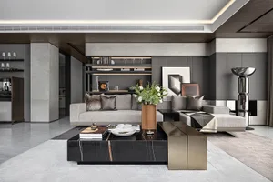 Modern living room with grey sofa, marble coffee table, and concrete walls.