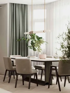 Modern dining room with a marble table and velvet chairs