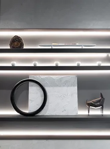 A modern minimalist interior design featuring concrete elements and a sleek, contemporary atmosphere.