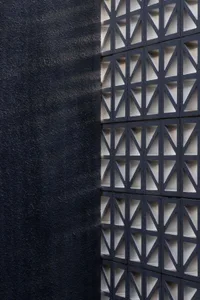 A concrete wall with geometric patterns