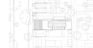 2D architectural drawing of a modern building layout on white paper