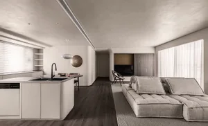 Modern minimalist living, dining, and kitchen space featuring concrete-style walls and a sleek, open layout with contemporary
